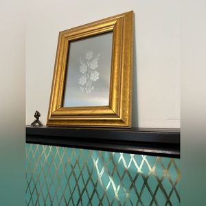 gold framed etched mirror